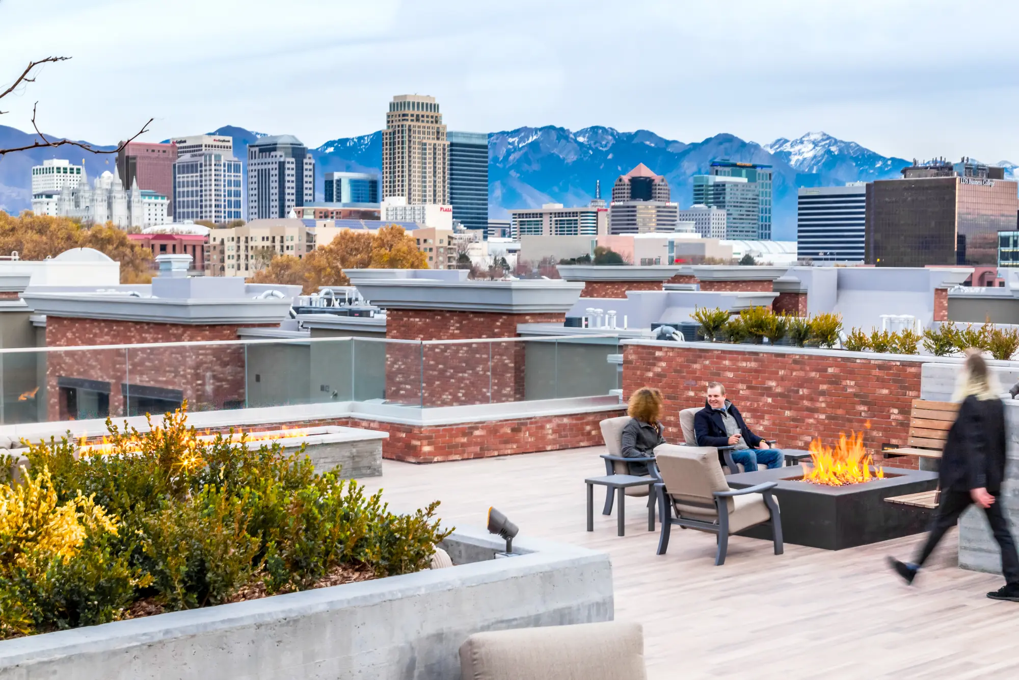 Fire lounges by day, skyline beyond