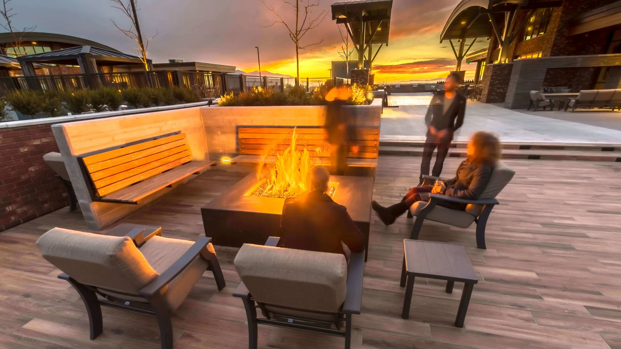 4th West rooftop fire pit at night