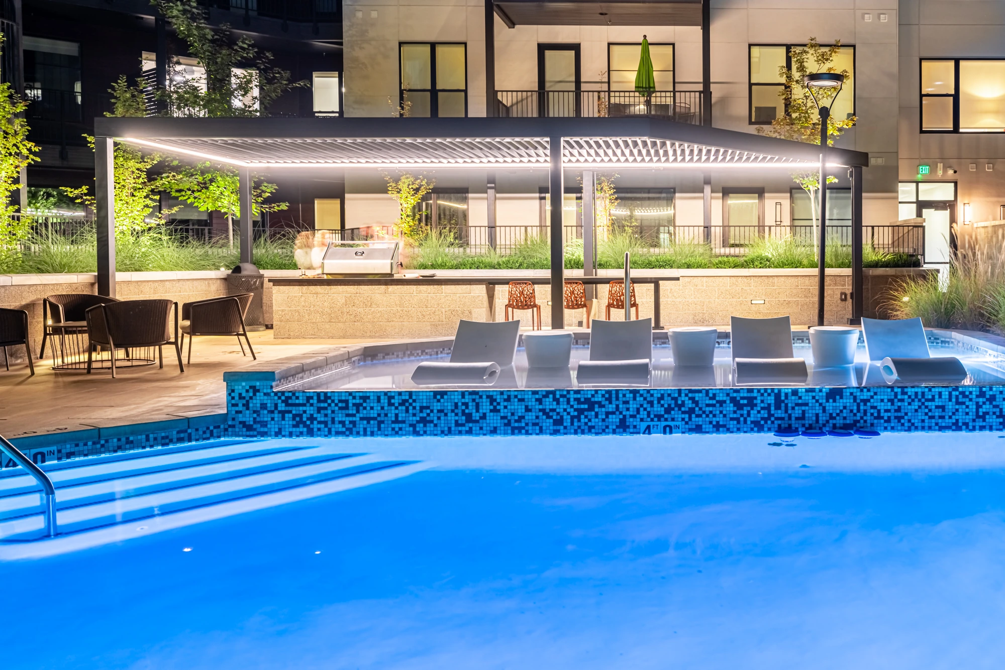The pool terrace · the building’s signature room