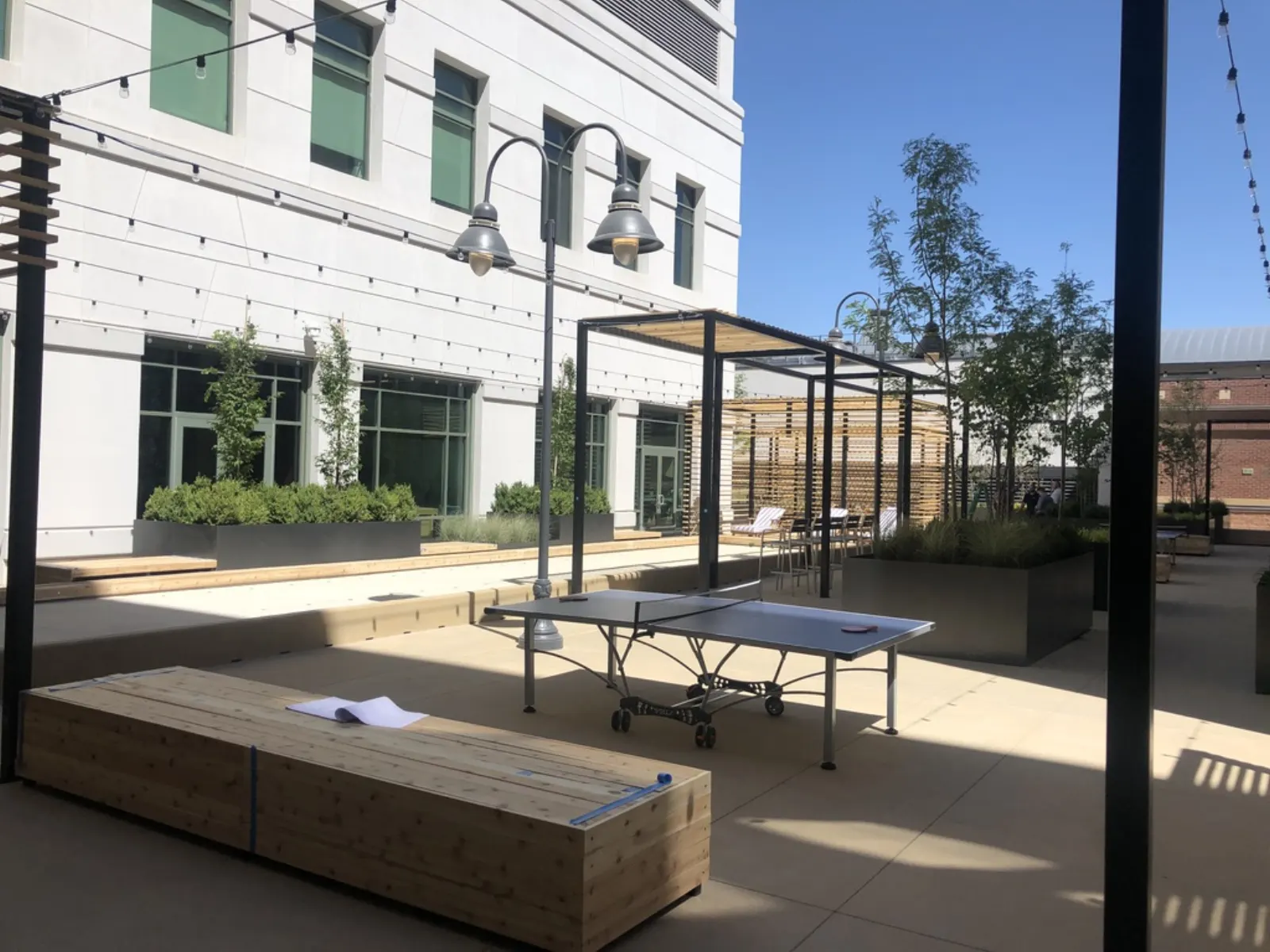 Hidden Gem rooftop amenity in use, the finished office patio