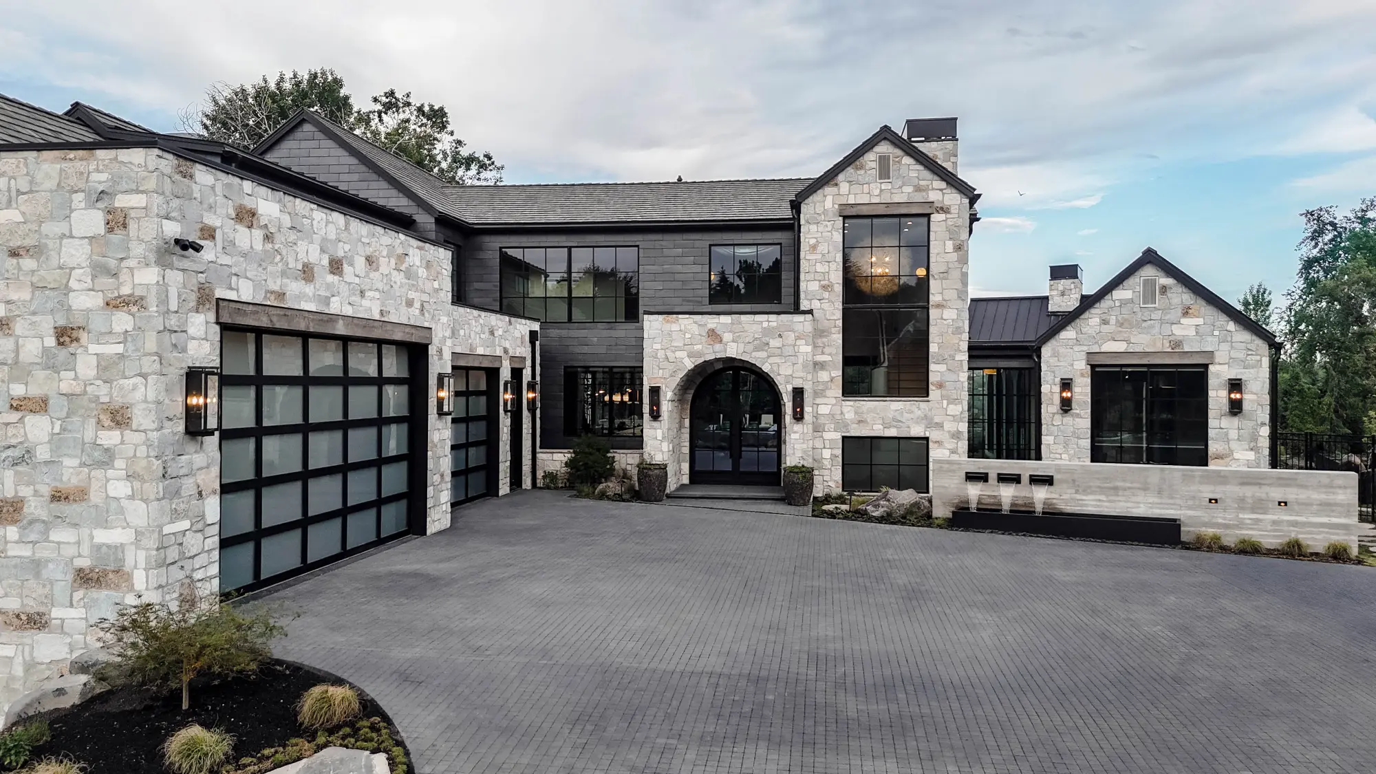 The arrival · motor court and front elevation