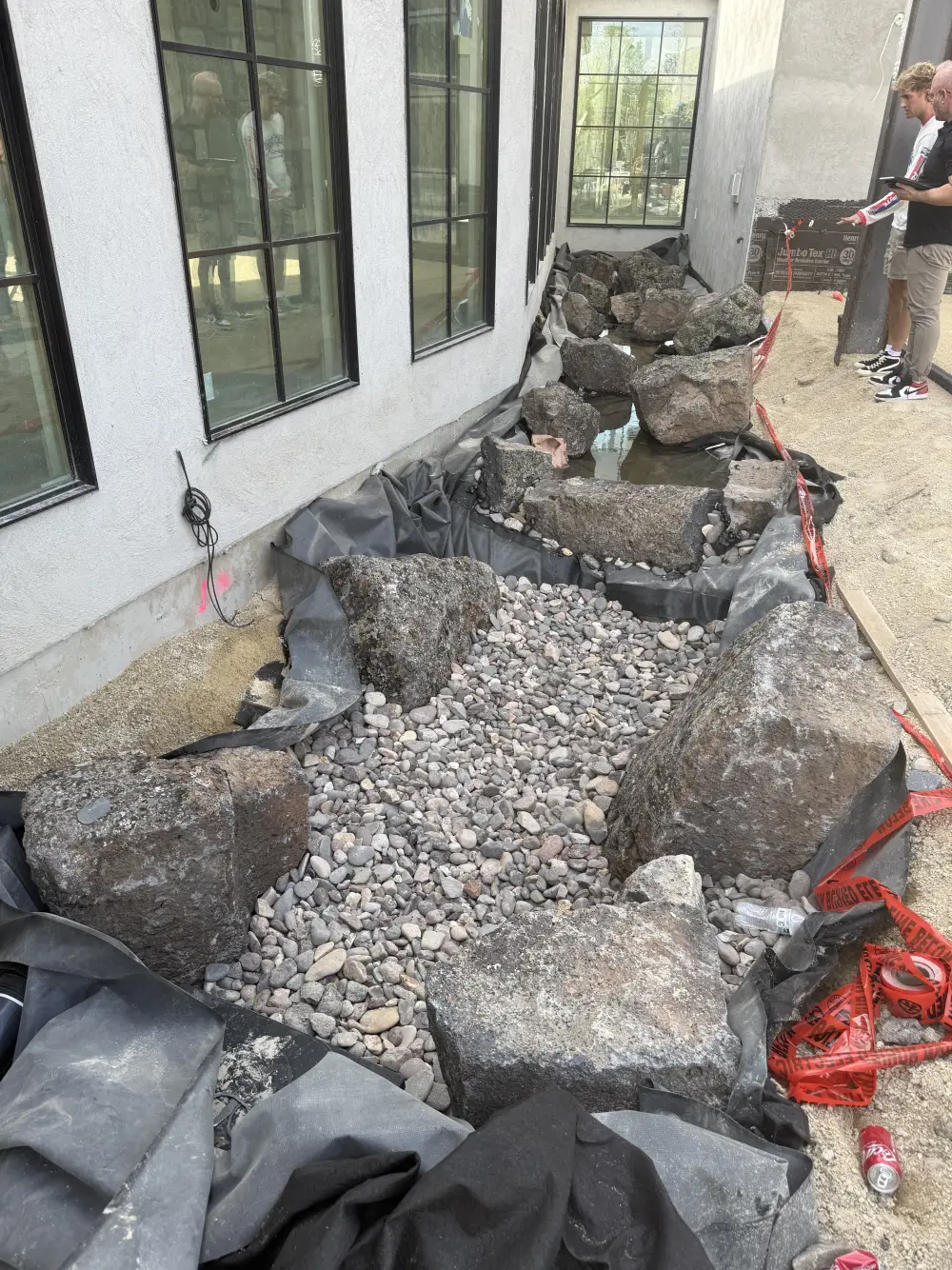 The creek, before · rock and liner against the glass